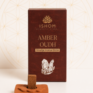 ISHOM Amber Oudh Smudge Incense Bricks with terracotta holder and natural incense bricks displayed on a white background.