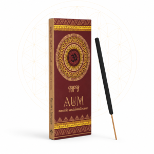 Gypsy AUM Nomadic Sandalwood Incense displayed in decorative burgundy packaging with gold mandala artwork and a single incense stick on a clean white background featuring a subtle Flower of Life design.