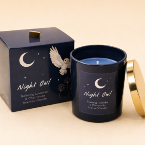 Night Owl Lavender & Chamomile scented candle in a navy glass jar with matching gift box and gold lid.