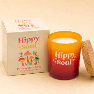 Hippy Soul Pomegranate & Fig scented candle in an orange and red ombre glass jar with cork lid and matching gift box.
