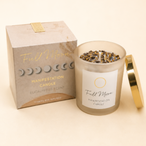 Full Moon Manifestation Candle with eucalyptus fragrance and Tiger's Eye crystals in frosted glass jar