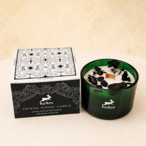 Hop Hare Crystal Magic Candle The Knight of Swords with Black Obsidian crystal in a deep green glass jar.