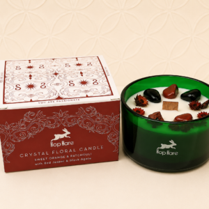 Hop Hare The Devil Crystal Magic Flower Candle with Sweet Orange & Patchouli fragrance, red jasper and black agate crystals.