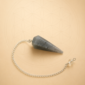 Grey Aventurine crystal pendulum with silver chain for dowsing and energy healing.